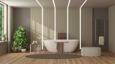 a modern bathroom with wooden floors and white bathtub in the center, surrounded by potted plants