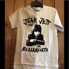 a white shirt with an image of joan jett and the blackbirds on it