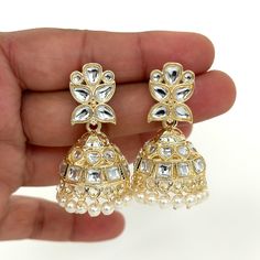 Small Light weight kundan Jhumka/kundan Jhumka/Indian Jewelry/Pakistani/Punjabi/Indian/Statement earring/Bridal earring/Indian wedding Lightweight and elegant  Style 1 Height = 48 mm || Width = 17 mm Style 2 Height = 44 mm || Width = 27 mm Pearl Jhumki Indo Western Earring Can be paired with any dress Closure: Pushback This is 100% Handmade jewelry. So Color, shades, texture displayed may slightly vary from the actual product due to digital image limitations. We request you to consider these min Diwali Kundan Meenakari Bridal Earrings, Festive Kundan Jhumkas With Stone Work, Celebration Kundan Meenakari Jhumkas, Celebration Kundan Jhumkas With Meenakari, White Kundan Jhumkas With Gota Work, Kundan Bridal Earrings With Cutdana For Festivals, Kundan Bridal Earrings With Cutdana For Diwali, Heavy Earrings For Wedding And Navratri, Bollywood Bridal Earrings With Meenakari And Kundan