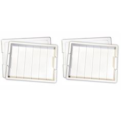 two white wall plates with pins attached to each side and one on the other side