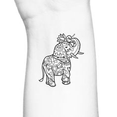 an elephant is drawn on the side of a white tank top with black and white designs