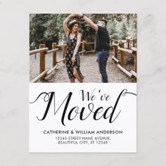 a photo save the date card with an image of two people dancing on a bridge