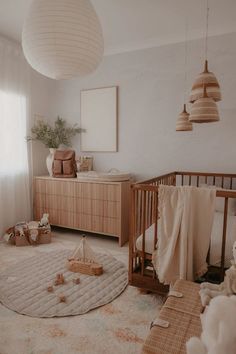 a baby's room with a crib and toys on the floor