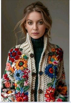 a woman wearing a colorful jacket with flowers on it