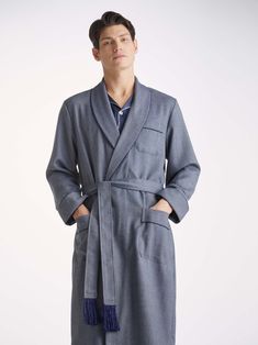 A free time staple, our Lincoln men's wool dressing gown features a classic shawl collar, a breast pocket and two front pockets for practicality while around the house. It's fastened with a tasselled belt for the perfect fit. Made from fine grade worsted wool, this luxury wool dressing gown ensures warmth, comfort and durability without being heavy or bulky. A must-have for the colder months, it looks great over our classic Basel men's t-shirt or combined with a pair of our luxury men's pyjamas Classic Long Sleeve Robe For Loungewear, Classic Long Sleeve Robe For Daywear, Mens Dressing Gown, Men's Robes, Striped Sleeve, Sleepwear & Loungewear, Dressing Gown, Mens Pajamas, Basel