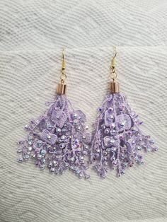 Beautiful lavender lace flowers with swarovski crystals. Very lightweight and delicate.  Perfect for any occasion! Elegant Lavender Dangle Crystal Earrings, Elegant Lavender Crystal Dangle Earrings, Elegant Lavender Crystal Earrings For Party, Elegant Lavender Earrings For Party, Lace Flowers, Etsy Earrings Dangle, Swarovski Crystals, Lavender, Jewelry Earrings Dangle