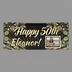 a 50th birthday banner with gold confetti