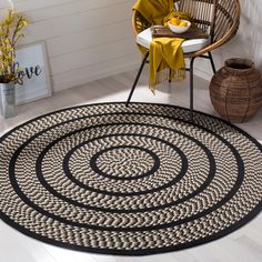 a round rug in the middle of a room