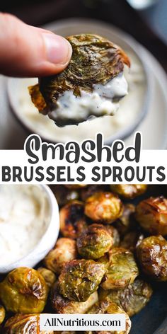 the brussel sprouts are being dipped with white sauce and served on a plate