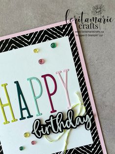 a birthday card with the words happy birthday written on it and confetti sprinkles