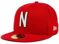 a red new era hat with the letter n on it