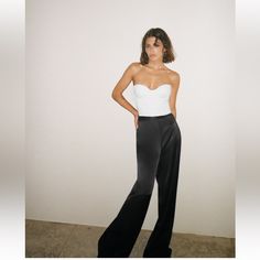 High Waisted Pants With False Front Pockets, Side Hidden In-Seam Zipper And Drawstring Detail At Waist Fitted High Waist Wide Leg Pants For Date Night, Fitted Sleek Wide Leg Pants For Party, Sleek Fitted Wide Leg Pants For Party, Elegant Wide-leg Pants For Night Out, Chic High Waist Pantsuit For Evening, Chic High-waist Pantsuit For Evening, Chic High Waist Pants For Date Night, Chic High-waist Pants For Date Night, Fitted Wide-leg Pants For Night Out