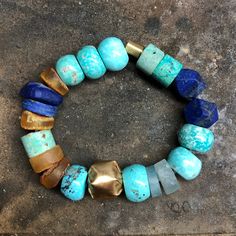 ANCIENT STONE BRACELET WITH 22K GOLD CLOSURE • DESIGNED AND HAND FORGED IN NEW YORK • STONES: TURQUOISE, LAPIS AND AMBER BEADS • LENGTH: 6.5 INCHES Please email info@elihalili.com or call the studio at 212-941-7979 for any inquiries. York Stone, Ancient Stone, Amber Beads, 22k Gold, Hand Forged, Stone Bracelet, Turquoise Jewelry, The Studio, Amber