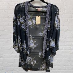 New With Tags!! Band Of Gypsies Navy Blue Floral Kimono With Paisley Print Boarder Size Xs/S - Runs Oversized Perfect For A Beach Coverup Or To Throw Over Jean/Shorts And Tank Top. Can Be Dressed Up Or Down Hi-Low Cut With Bell Like Elbow Length Sleeves 100% Polyester Approx Measurements: Pit To Pit - 28” Length - Front 29” & Back - 37” Comes From Clean, Smoke Free Environment Feel Free To Ask Any Questions! Spring Blue Tops One Size, Blue Open Front Top For Spring, Bohemian Blue Open Front Top, Casual Open Front Tops For Festival, Shorts And Tank Top, Top Band, Floral Kimono, Elbow Length Sleeve, Paisley Print