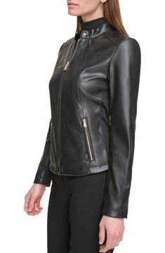 leather with glinting hardware.faux jacket expertly crafted from motoRide off into the sunset in this sleek Band collar Zip cuffs 100% polyurethane with 100% polyester contrast Spot clean Imported Model stats: 5'10" height, 32" bust, 25" waist, 36" hip. Model is wearing size Small. Sleek Leather Jacket With Zipper Closure, Sleek Fitted Faux Leather Outerwear, Sleek Leather Jacket With Zipper For Spring, Fitted Faux Leather Jacket, Fitted Faux Leather Biker Jacket With Zip Detail, Fitted Faux Leather Biker Jacket With Zip Fly, Sleek Black Leather Jacket With Zipper Closure, Faux Leather Jacket With Zipper Closure For Work, Sleek Black Leather Jacket With Zipper