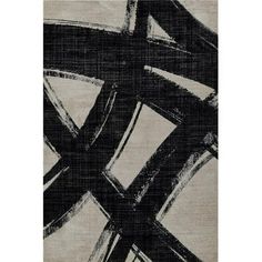 a black and white rug with an abstract design