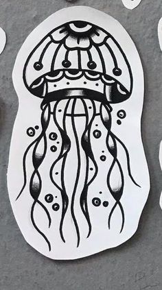 a sticker with an image of a jellyfish on it's face and some bubbles around it