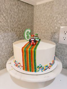 #mariobroscake #funfetti #cake #mario Mario Kart Birthday Party Cake, Mario Bday Cake, Mario Rainbow Road Cake, Simple Mario Cake, Mario Birthday Party Cake, Mario Cake Ideas, Bowser Cake, Mario Kart Birthday Cake, Cake Mario