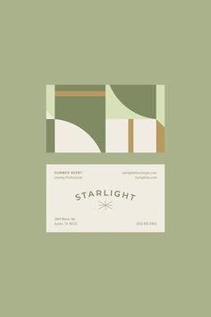 a green and white business card with the word starlight on it's side