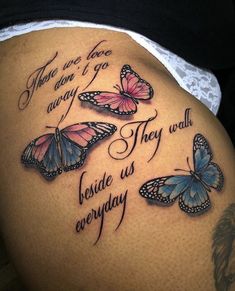 a woman's stomach with three butterflies on it and the words, there is love always