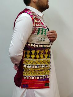 Beautiful Vintage Old Afghani stunning Multi color waistcoat Only one Ready Piece. Our amazing embroidered Afghani waistcoat is the absolute ultimate . And the colors will knock your socks off. Embroider the hell out of them. And you get this, an extraordinary piece of outerwear for Men And Women. We Deliver Worldwide . Festival Multicolor Embroidered Vest, Festival Embroidered Multicolor Vest, Embroidered Multicolor Vest For Festivals, Traditional Multicolor Vest For Festival, Traditional Multicolor Festive Vest, Traditional Red Vest For Festival, Vintage Coins, Mens Vests, Plus Ultra