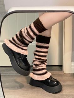 These knitted leg warmers feature a striking color-blocked stripe pattern, accented with charming ruffle edges at the hem. The design exudes a playful yet sophisticated vibe, perfect for adding a touch of whimsy to any outfit.  Please note, the price includes one pair of leg warmers only. Average Outfits, Cute Legwarmers, Knitted Leg Warmers, Blue Denim Skirt, Bad Guys, The Vibe, Color Stripes, Cut Jeans, Leg Warmers