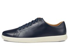 The Cole Haan Grand Crosscourt II - Casual luxury for your everyday looks. Lightweight, cushioned sneaker with premium leather upper and breathable Grand.ØS technology lining for all-day style and comfort. Low-top lace-up design keeps your outfit casually cool while flexible cushioning and energy return keep you moving in comfort. Only 10oz but full of features Instagram users will appreciate - from the padded footbed to elegant yet versatile sneaker look. Capture your best street style looks an Classic Low-top Golf Shoes With Cushioned Footbed, Classic Low-top Cushioned Golf Shoes, Classic Walking Sneakers With Rubber Sole, Classic Low-top Golf Shoes With Rubber Sole, Classic High-top Walking Sneakers, Classic High-top Sneakers For Walking, Classic Low-top Golf Shoes With White Sole, Casual Leather Golf Shoes With White Sole, Classic Synthetic Sneakers For Walking