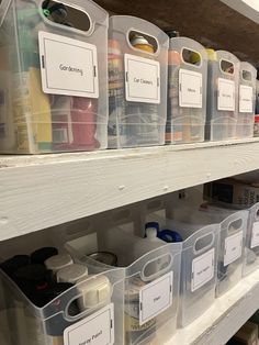 the shelves are filled with plastic containers and labeled labels