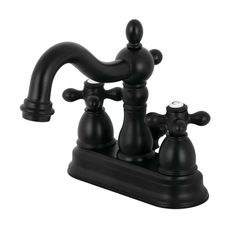 a black faucet with two handles and nozzles