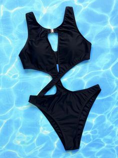 Elevate your beachside look with our stunning Hollow Out Monochrome Bandage Bodysuit Swimsuit. Crafted with precision, this swimsuit features a captivating hollow out design and sleek bandage straps for a bold and alluring silhouette. Whether lounging by the pool or hitting the waves, this swimsuit effortlessly combines style and comfort for a memorable swimwear statementPattern: Solid colorWith Steel Support: With padded cups, no steel supportColor: BlackSize: S, M, LStyle: One-piece swimsuitPa