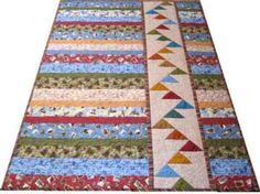 a multicolored area rug is shown on the floor