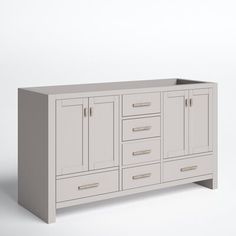 an image of a white cabinet with drawers