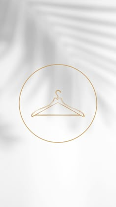 a golden hanger on a white background with the word's name below it