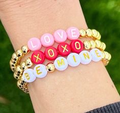 💗The listing is for one bracelet. Perfect for adding to a stack of wearing alone! Bracelets make a great gift!  💗Gold bracelet is made with 14k gold plated beads in 5mm. Choose from white letter beads with gold, red letter beads with gold or pink letter beads with white and customize the word or type in a name!    💗Bracelet makes a perfect gift for the one you love!  XXS- 5.5 inches XS- 6.0 inches S- 6.5 inches M- 7.0 inches L- 7.5 inches 💗Each bracelet is custom made so all sales are final Girly Crafts, Valentines Bracelets, Bracelet Stacking, Clay Bracelet, Pink Letter, Girls Valentines, Bracelet Ideas, Letter Beads, Gift For Girls