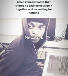 a man sitting in front of a laptop computer with a quote on it that reads, new york when i finally relize that theres no chance of us