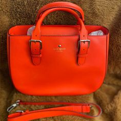 Coral Kate Spade Bucket Bag. Dust Bag Included. Original Stuffing Included For Shape. Pre- Owned. Luxury Orange Handheld Bag, Luxury Handheld Orange Bag, Classic Orange Evening Bag, Classic Orange Crossbody Bag, Classic Orange Shoulder Bag With Top Carry Handle, Classic Orange Bag With Detachable Strap, Elegant Orange Satchel, Luxury Kate Spade Bag With Adjustable Strap, Kate Spade Bags With Detachable Strap For Errands