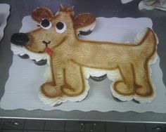 a cake shaped to look like a dog