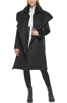 An inset bib panel with a stand collar brings runway-ready edginess to a belted coat woven from a luxurious wool blend. 46" length (size S) Drape collar with inset stand collar Long sleeves Asymmetric zip closure Front welt pockets Lined Shell: 60% wool, 40% polyester; Faux fur: 50% acrylic, 50% modacrylic 
 Dry clean Imported Model Stats: 5'10" height; 34" bust; 27" waist; 35" hips. Model is wearing size S. Structured Black Winter Outerwear, Black Structured Outerwear For Spring, Structured Black Outerwear For Spring, Belted Coat, Karl Lagerfeld Paris, Wool Blend Coat, Fur Trim, Welt Pockets, Karl Lagerfeld