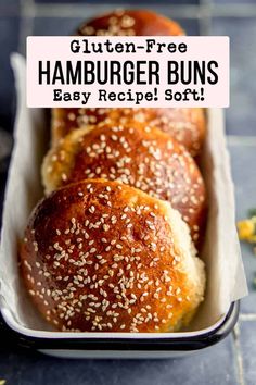 three hamburger buns in a white container with sesame seeds on top and the text gluten - free hamburger buns baby recipe soft