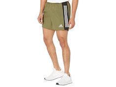 adidas Own the Run 5 Shorts - Men's Shorts : Focus Olive/Black : The primary materials that compose this product contain a minimum of 20 percent recycled content. Kick it into high gear with the adidas Own the Run 5 Shorts. Keep your stride from start to finish with the adidas Own The Run 9 Shorts. adidas Running apparel delivers superior performance with a comfortable finish making it easier to rack up those miles. AEROREADY moisture-wicking fabric pulls sweat away from the skin and pushes it t Functional Three Stripes Activewear For Running, Adidas Logo Athletic Shorts For Jogging, Adidas Athletic Shorts For Jogging, Three Stripes Athletic Fit Activewear For Running, Sportswear Running Shorts With Three Stripes, Sporty Running Shorts With Three Stripes, Adidas Functional Activewear For Jogging, Adidas Activewear For Jogging, Functional Running Activewear With Three Stripes