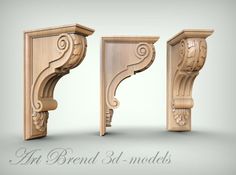 three wooden corbs with scroll designs on them