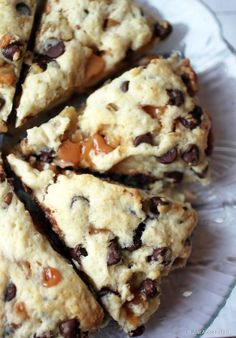 a white plate topped with chocolate chip scones