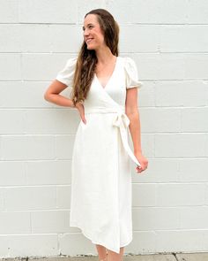 Expertly crafted from luxurious linen, our Cream Wrap Maxi Dress is a must-have for any fashion-forward wardrobe. The wrap waist ribbon cinches the silhouette for a flattering fit, while the short sleeves add a touch of sophistication. Elevate your style with this timeless piece. Headband Jewelry, Diff Eyewear, Wrap Maxi Dress, Shoe Boot Sandals, Luxury Linen, Midi Maxi Dress, Maxi Wrap Dress, Sneaker Heels, Elevate Your Style