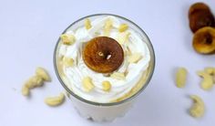 there is a drink with whipped cream and nuts in it