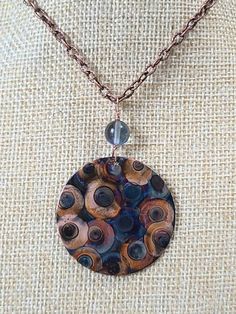 "This necklace is made with copper and fire only! I make it by painting patterns onto copper with a micro torch, and as the copper heats and cools it turns different colors naturally! The copper circle 1 1/2\" and is attached to a 30\" chunky copper chain. Definitely a one of a kind piece! These are custom made per order, so please remember - I have little control of what colors happen - your piece may not look exactly like the picture - it may be similiar, it may be more vibrant, it may be a di Multicolor Round Copper Jewelry, Artsy Brown Copper Jewelry, Handmade Rust-colored Copper Necklaces, Handmade Rust Copper Necklaces, Unique Multicolor Copper Necklace, Multicolor Copper Necklace, Artistic Brown Copper Jewelry, Artsy Hand Forged Copper Jewelry, Artisan Nickel-free Copper Necklaces