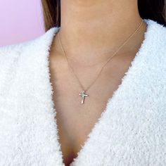 A bold statement of faith, this stylish women's cross necklace from Shy Creation® features a cross embellished at the center with brilliant round diamond accent. Fashioned in 10K white gold, the total diamond weight is 1/10 carat and the 18-inch rolo chain secures in place with a lobster clasp. Diamond Accents Pendant Cross Necklace, Diamond Cut Cross Pendant Necklace, Gift Cross Necklace With Diamond Accents, Sterling Silver Diamond Cut Cross Pendant Necklace, Diamond Cross Clavicle Chain Jewelry, Sterling Silver Cross Necklace With Diamond Accents, Sterling Silver Cross Necklace With Diamond Cut, White Gold Cross Necklace With Clavicle Chain, Fine Jewelry Diamond Cut Crucifix Cross Necklace