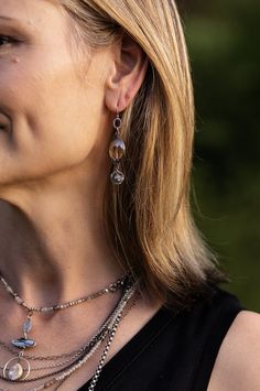 A fun pair of dangle earrings in a handcrafted herringbone design. This artisan design rests at approximately 2.25" from sterling silver ear wires. Antique Silver Plated Brass (Lead & Nickel Free) Crystal 2.25" with sterling silver ear wires We hand select our natural materials, thus there may be slight variations in color and/or size that will not detract from the overall aesthetic. Our unique handcrafted designer jewelry for women is made in America, each design created individually in our per Nickel-free Unique Silver-plated Jewelry, Modern Nickel-free Drop Jewelry, Artisan Sterling Silver Nickel-free Chandelier Earrings, Artisan Sterling Silver Chandelier Earrings Nickel Free, Unique Nickel-free Dangle Linear Earrings, Bohemian Teardrop Silver Plated Wire Jewelry, Bohemian Teardrop Silver Plated Jewelry, Adjustable Hypoallergenic Sterling Silver Wrap Earrings, Artisan Long Drop Sterling Silver Earrings