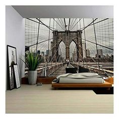 an image of a bedroom scene with the brooklyn bridge in new york city wallpaper