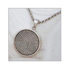 A classic fingerprint necklace option.  This is a perfect necklace for a man or woman.  It is timeless and a beautiful tribute options for that special loved one.  This pendant may be customized on the back with your choice of options for an additional cost. Lifetime promise! The print quality is promised for life. If the print quality ever degrades, we will replace the piece free of charge. Dimensions: Chamber style in 925 sterling silver, stainless steel, 14K solid yellow gold, 14K solid white Classic Stamped Jewelry For Memorial Occasion, Elegant Hand Stamped Memorial Necklaces, Elegant Hand Stamped Necklace Keepsake, Elegant Memorial Hand-stamped Necklaces, Elegant Hand Stamped Keepsake Necklaces, Elegant Memorial Hand Stamped Necklaces, Elegant Hand Stamped Keepsake Necklace, Elegant Hand Stamped Necklace For Keepsake, Classic Etched Necklace For Anniversary