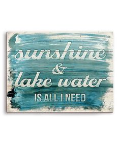 a wooden sign that says sunshine and lake water is all i need